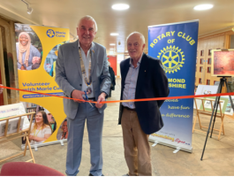 Richmond Rotary President Mac Bryant
(left) opening the Charity Art Exhibition at The
Station, Richmond, watched by organiser Richard Gibson. 